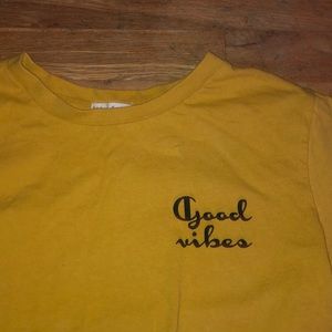 Mustard colored yellow cropped tee!